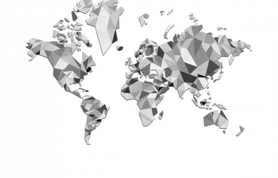 Czarno biała fototapeta na ścianę z graficznym motywem mapy świata - zdjęcie aranżacyjne